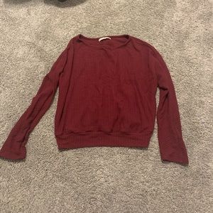 Cropped red sweater.